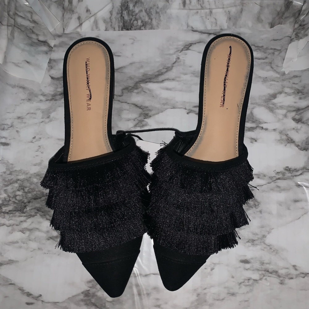 Black pointed toe flats with fringe detail. NWT! Size 8